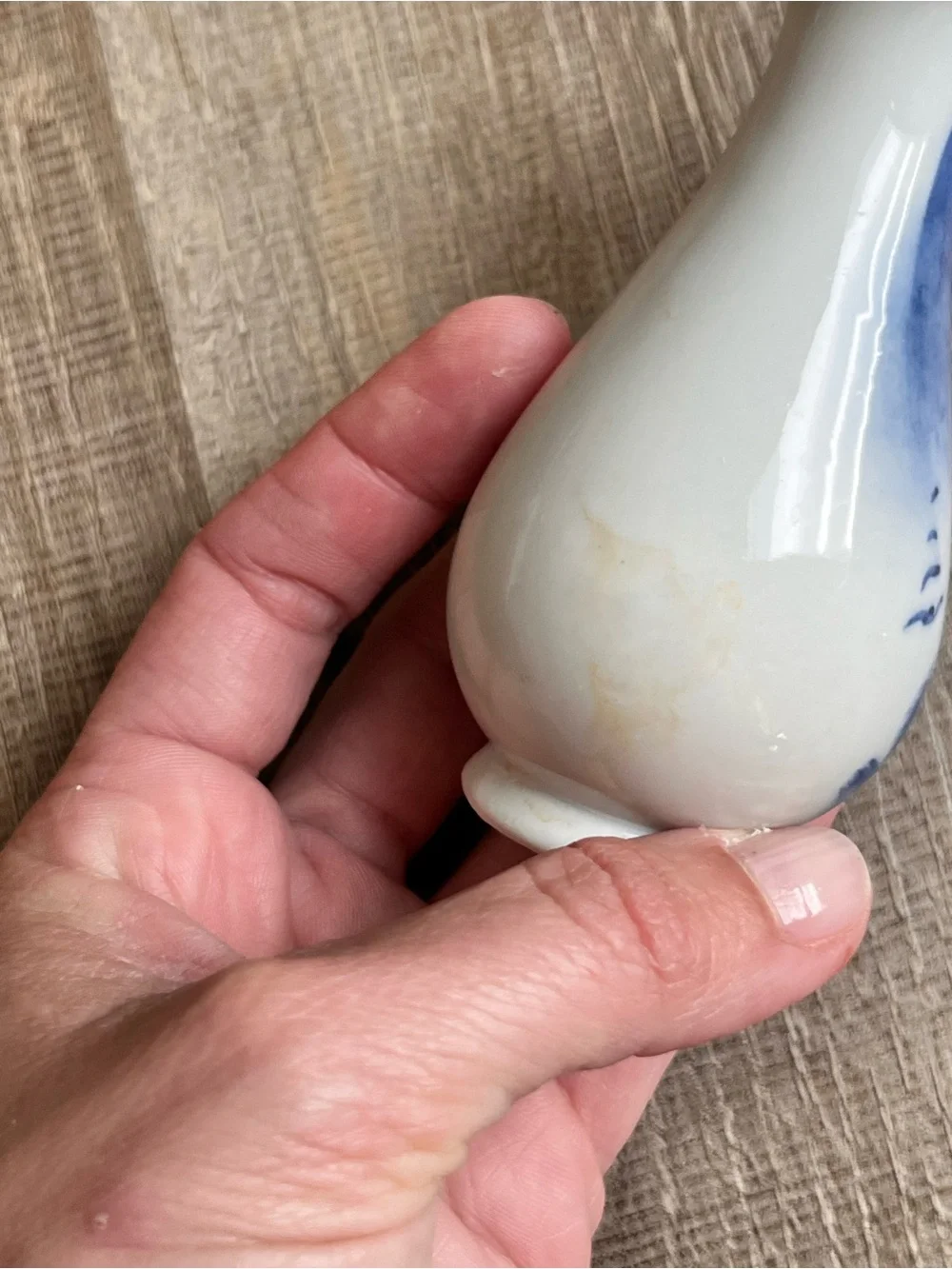 Chinese style porcelain bud vase with a flared rim and hand-painted landscape